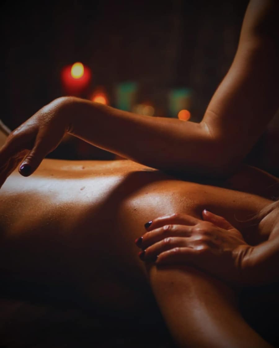 Relaxing body massage with warm oils